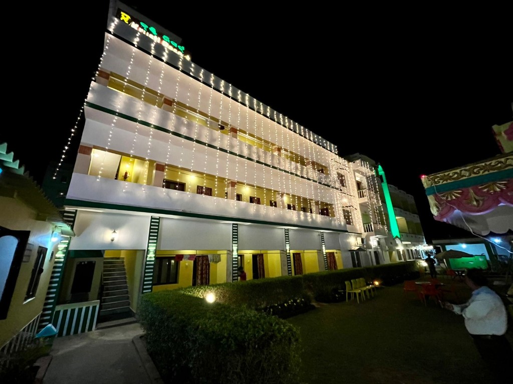Krusti Resort facade lit at night